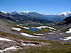 Le lac sans fond, en arrière planc l'Aiguille de la grande Sassière, Le Mont Pourri et le lac du chevril